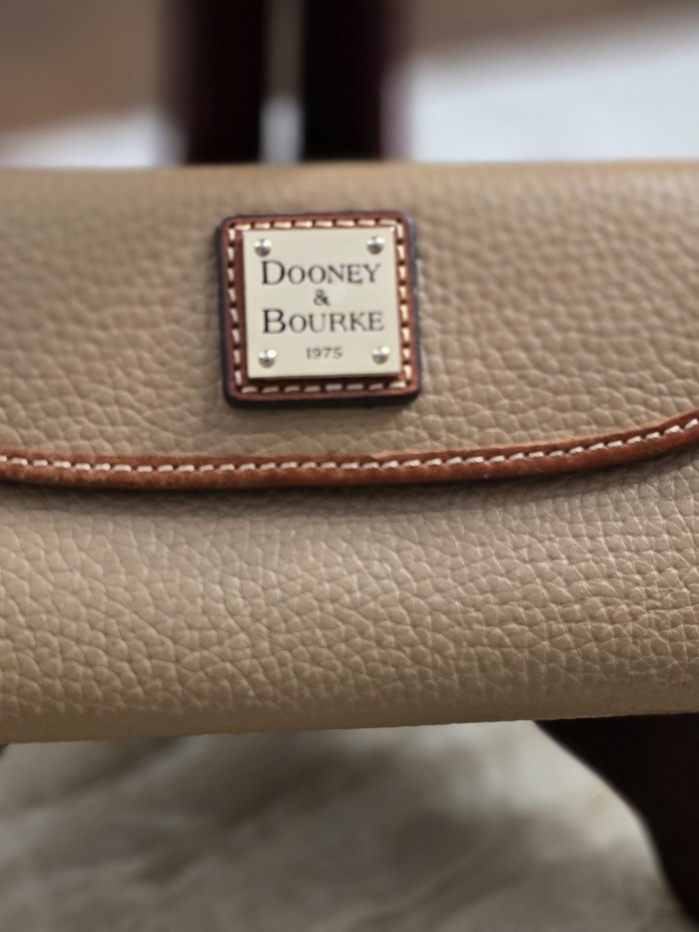 Dooney & Bourke Taupe Pebbled Leather Wallet with Brown Trim